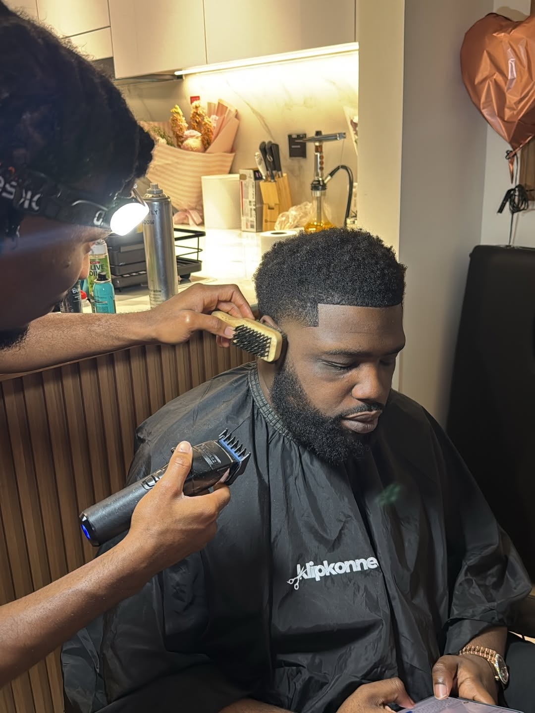 KlipKonnect barber at work
